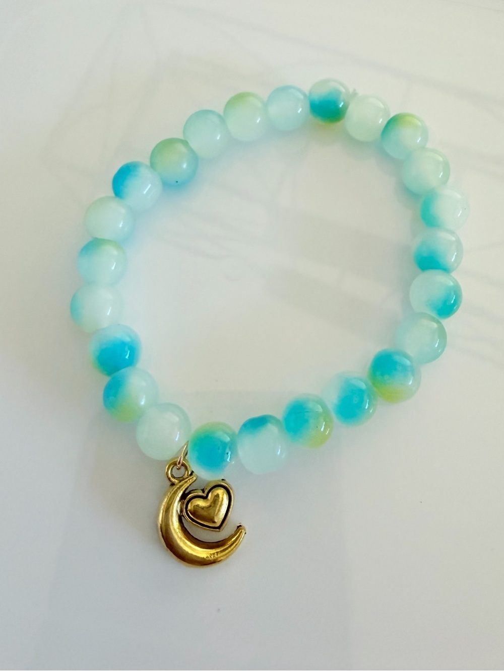 Aqua and Seafoam Beaded Stretch Bracelet with Gold Moon Heart Charm